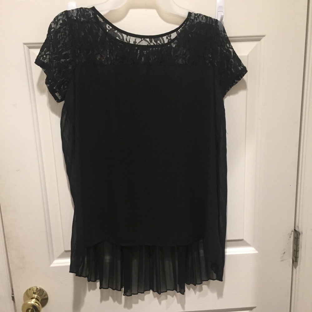 Flowy black top with lace cap sleeve detail